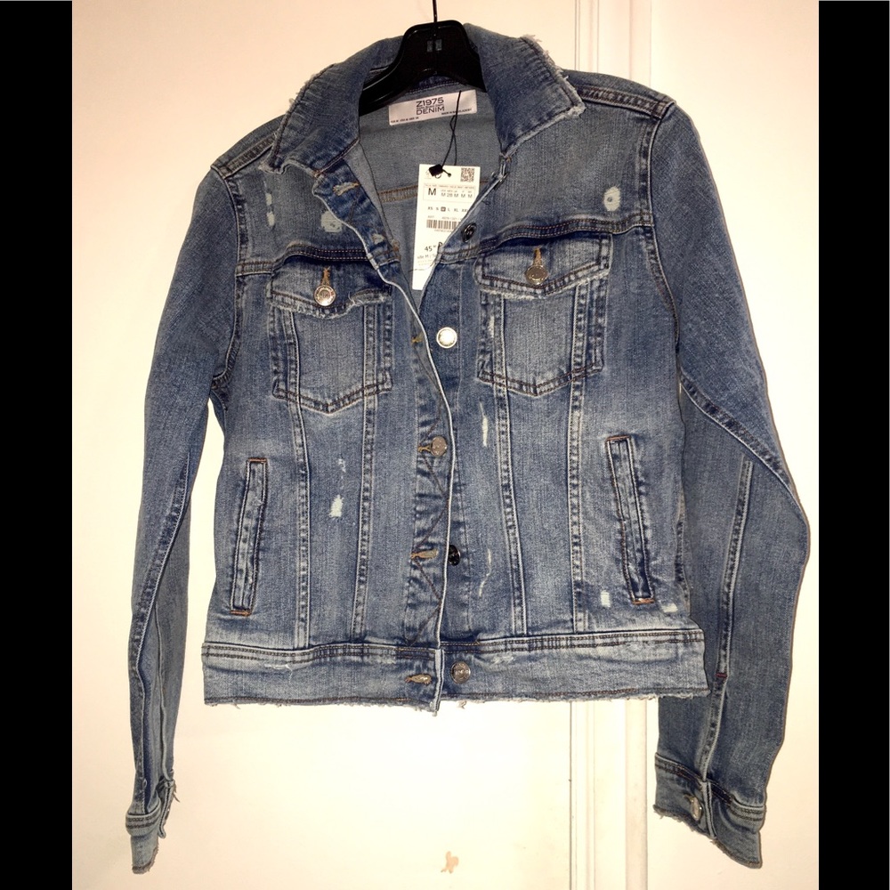 NWT Distressed denim jacket.